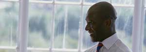 Businessman in front of a window