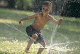 Kid playing with water 