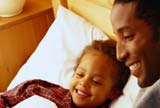 Father and son smiling 