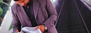 Man Reading Newspaper
