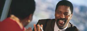Customer representative conversing with a client