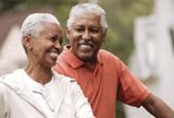 Elderly couple riding a bike
