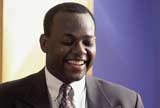 Executive laughing out loud