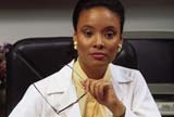 Family doctor at her office