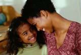 Woman smiling at her daughter