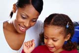 Woman playing with her daughter