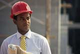 Man inspecting construction progress of his new business  