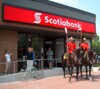 two mounties on horseback in front of our Russell, Ontario branch