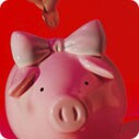 Penny being dropped into piggybank