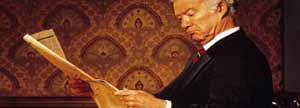 Man reading newspaper