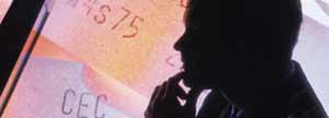Profile of man with financial figures in background
