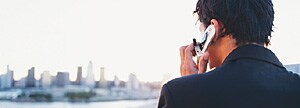 Man using a cell phone.