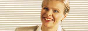 A woman smiling.