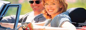 Couple in convertible car