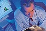 Man reading at computer