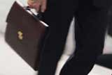 Person holding briefcase