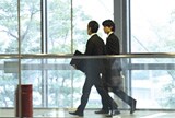 Two men walking.