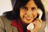 A businesswoman talking on the phone.
