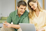 couple with computer