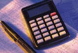 calculator and newspaper