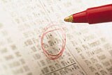 circled stock price in newspaper