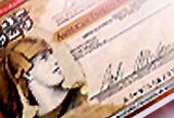 close up of an American Express Travellers Cheque