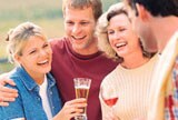 two couples share a toast