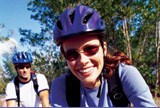 Woman and man bicycling