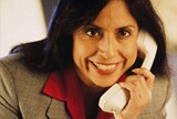 Femme d'affaires au téléphone