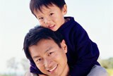 Father with son on shoulders - SLF only
