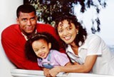 Family at the porch of their home