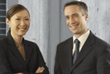 Two smiling businesspeople