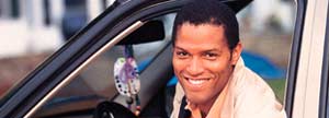 Man sitting in his new car