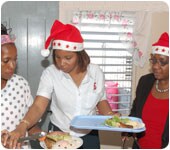 Volunteers helping to serve at a Christmas luncheon