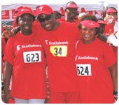 Volunteers smilisng after a race