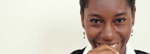 Businesswoman smiling in bright background