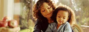 Mother and daughter sitting