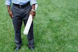 Man holding construction plans