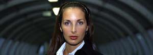 Businesswoman in an airport tunnel