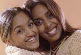 Woman holding her daughter