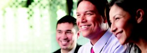 Three Scotiabank employees smiling
