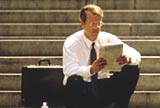 Businessman reading the newspaper
