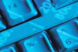 Financial numbers over a keyboard background