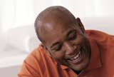 Smiling guy in a living room