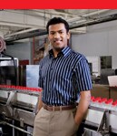 Business owner in production line