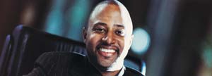 Smiling man in office chair