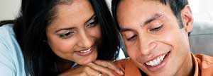 Young couple looking at an account statement