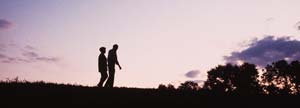 Couple having a walk at dusk