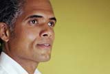 Man in yellowish background