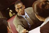 Financial advisor attending to a client
